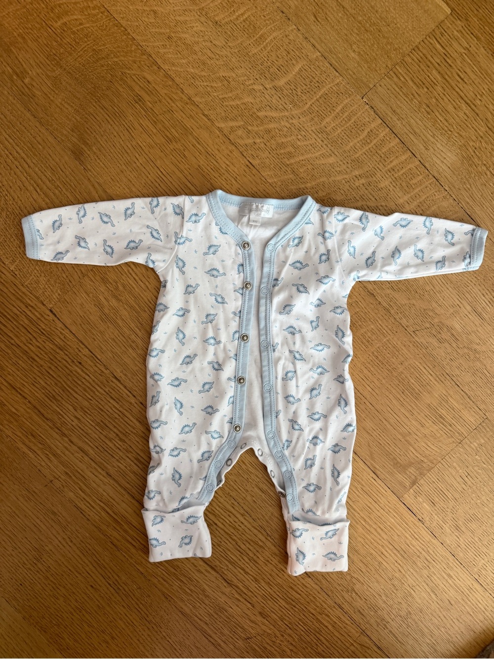 Magnolia White One-Piece Footie with Light Blue Dino Print